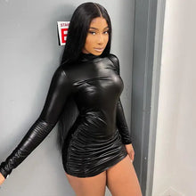 Load image into Gallery viewer, Woman wearing a Be So Faux Real faux leather ruched mini dress, showcasing edgy elegance for a night out.