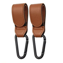 Cargar imagen en el visor de la galería, PU leather baby stroller hooks with black carabiners for easy bag attachment on pram. Set of two, ideal for organizing essentials.