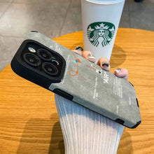 Cargar imagen en el visor de la galería, Person holding Luxury Leather Sneaker Phone Case in Starbucks, showcasing sleek design and high-quality protection for iPhone.