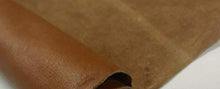 Cargar imagen en el visor de la galería, Close-up of brown leather hide for crafting, showcasing cow skin texture and quality.