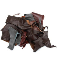 Load image into Gallery viewer, Assorted brown and black cowhide leather scraps for crafts from REED, ideal for arts and crafts projects using garment leather remnants.
