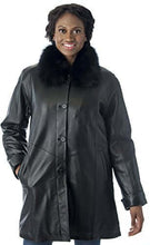 Cargar imagen en el visor de la galería, Luxurious REED lamb leather swing coat with detachable fox fur collar modeled for elegant fashion style.