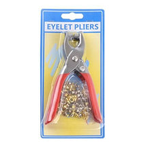 Cargar imagen en el visor de la galería, Eyelet pliers set with red handles and golden eyelets, packaged in clear plastic, ideal for crafting and leather work.
