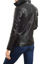 Cargar imagen en el visor de la galería, Woman wearing REED EST. 1950 black lambskin leather jacket with stand up collar, showcasing sleek design and premium quality.