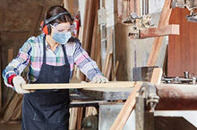 Cargar imagen en el visor de la galería, Craftsperson wearing eZthings face mask and safety gear while woodworking, demonstrating the product's application in craft projects.