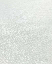 Cargar imagen en el visor de la galería, Close-up of white creamy lambskin leather hide showcasing its buttery soft and smooth texture.