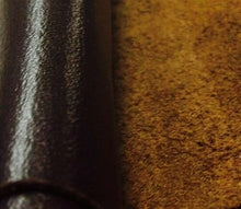 Cargar imagen en el visor de la galería, Close-up of leather hides in various colors, showcasing smooth and textured cow skins, ideal for leather crafts and projects.