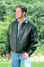 Load image into Gallery viewer, Man wearing REED Men's All American Bomber Leather Jacket in a garden setting, showcasing premium USA-made quality, style, and durability.