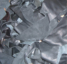 Cargar imagen en el visor de la galería, Assorted 2-lb black leather scraps for crafts, ideal for unique projects like wallets and jewelry. Diverse shapes from garment cutting.