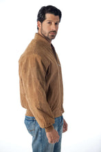 Load image into Gallery viewer, Man wearing REED men's baseball suede leather jacket in brown, showcasing classic style with satin lining for fall and spring.