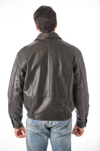 Cargar imagen en el visor de la galería, Back view of man wearing REED Men's New Zealand Lambskin Leather Jacket in black, showcasing soft-touch lambskin material.