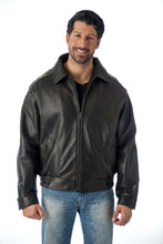 Load image into Gallery viewer, Model wearing REED Men's All American Bomber Leather Jacket, union made in USA, classic bomber style in black leather.