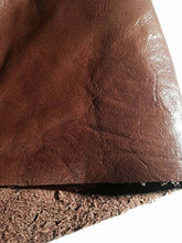 Cargar imagen en el visor de la galería, Close-up of REED leather hide, whole skin in rich brown color, showcasing soft, durable texture with antique finish, ideal for crafts.