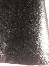 Cargar imagen en el visor de la galería, Close-up of REED leather hide in black, soft sheepskin with an antique finish, ideal for crafting unique art pieces, 7 to 10 SF.