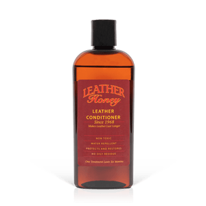 Leather Conditioner bottle for softening and restoring leather items, non-toxic formula for car seats, couches, and more.