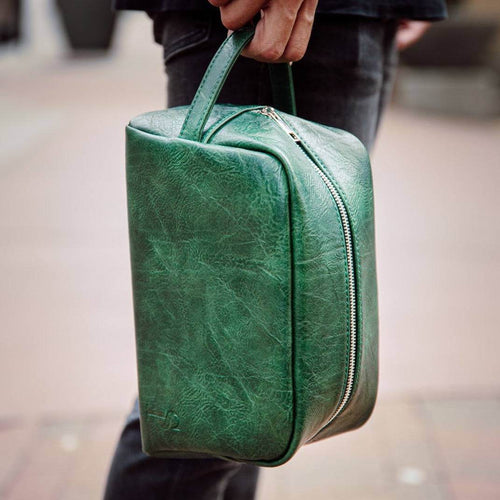 Emerald Green Leather Toiletry Bag for travel and commuting, easily fits in a backpack, gym bag, or suitcase.