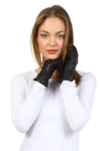 Woman wearing Classic Leather Plush Lined Driving Gloves with sleek design, soft leather, plush lining, and snap wrist closure in medium size.