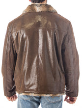 Load image into Gallery viewer, Brown leather jacket with fur collar on a white background
