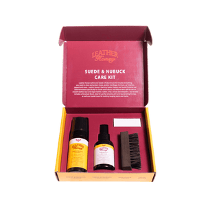 Suede & Nubuck Care Kit with cleaner, protector, horsehair brush, and eraser for cleaning and protecting suede and nubuck items.
