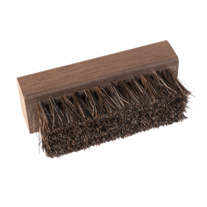 Horsehair brush from Suede & Nubuck Care Kit for cleaning suede and nubuck leather.