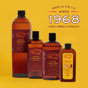 Various bottles of Leather Conditioner by Leather Honey, family-owned in the U.S. since 1968, for restoring and protecting leather items.