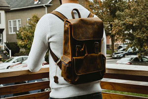 The Hagen Backpack | Vintage Leather Backpack showcased in outdoor setting, emphasizing genuine cowhide leather quality and style.