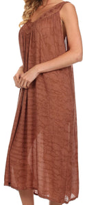 Woman wearing brown scoop neck sleeveless dress with sequin embroidery, perfect as summer dress or swimsuit cover up