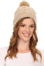 Cargar imagen en el visor de la galería, Model wearing a Greer unisex heathered textured knit pom pom beanie hat in beige color.
