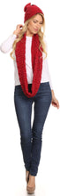 Charger l&#39;image dans la galerie, Model wearing red Haile woven classic beanie with pom pom and matching infinity scarf; casual style with jeans and white top.
