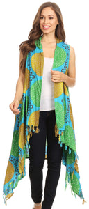 Woman wearing Hatice Light Colorful Poncho Wrap with African Ankara Print, featuring vibrant colors and fringe, ideal for casual use.