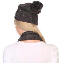 Charger l&#39;image dans la galerie, Back view of model wearing Kae Jewel Studded Cable Knit Beanie and Scarf Set in grey with pom pom detail
