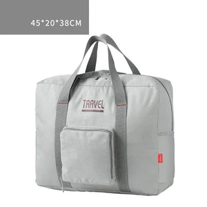 Grey foldable canvas travel bag with large capacity and dimensions 45x20x38cm for men and women.