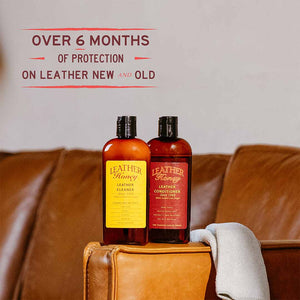 Leather Care Kit with cleaner and conditioner for leather protection on couch.