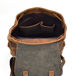 Open view of The Hagen Backpack | Vintage Leather Backpack with spacious main compartment and pockets for versatile use.
