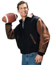 Charger l&#39;image dans la galerie, Man wearing REED executive varsity jacket with leather sleeves holding a football
