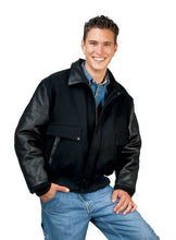 Charger l&#39;image dans la galerie, Man wearing a REED leather varsity bomber jacket with black leather sleeves, showcasing a classic and stylish USA-made design.
