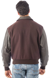 Back view of a man wearing a REED leather varsity bomber jacket in brown wool with black leather sleeves, showcasing a classic style.