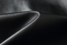 Load image into Gallery viewer, Close-up of luxurious black genuine leather texture, highlighting softness for jackets.

