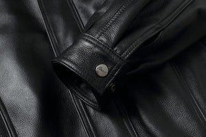 Close-up of REED Men's American Style Bomber Genuine Leather Jacket cuff detailing, showcasing premium genuine leather texture and sleek design.