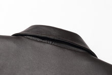 Load image into Gallery viewer, Close-up of REED Men&#39;s American Style Bomber Jacket in genuine leather, showcasing soft luxurious material and sleek design.
