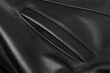 Load image into Gallery viewer, Close-up of genuine leather texture on a REED Men&#39;s American Style Bomber Jacket, highlighting its luxurious and durable quality.

