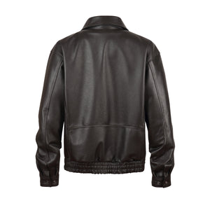Back view of REED Men's American Style Bomber Genuine Leather Jacket showcasing sleek design and luxurious feel.