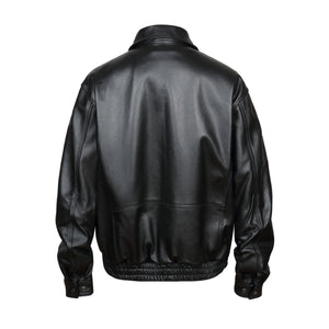 Rear view of REED Men's American Style Bomber Genuine Leather Jacket, showcasing sleek black leather and classic design.