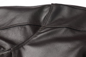 Close-up view of REED Men's American Style Bomber Genuine Leather Jacket highlighting rich leather texture