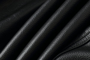 Close-up of luxurious black genuine leather texture for REED Men's Bomber Jacket