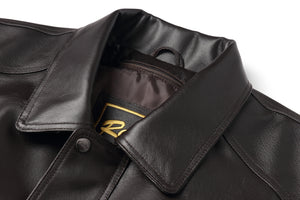 Close-up of REED Men's American Style Bomber Jacket in genuine leather showcasing luxurious craftsmanship and classic design.