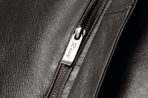 Close-up of zipper on REED Men's American Style Bomber Leather Jacket highlighting genuine leather texture and craftsmanship