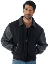 Charger l&#39;image dans la galerie, REED Men&#39;s Executive Varsity Jacket with cowhide leather sleeves and wool body, union-made in the USA, worn by a model.

