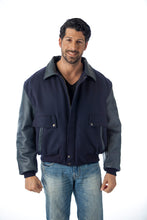 Charger l&#39;image dans la galerie, Man wearing a REED leather varsity bomber jacket with top grain leather sleeves, crafted in the USA, ideal for a stylish and timeless look.
