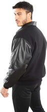 Charger l&#39;image dans la galerie, REED Men&#39;s Premium Varsity Jacket featuring leather sleeves and wool body, designed in USA. Stylish outerwear for all seasons.
